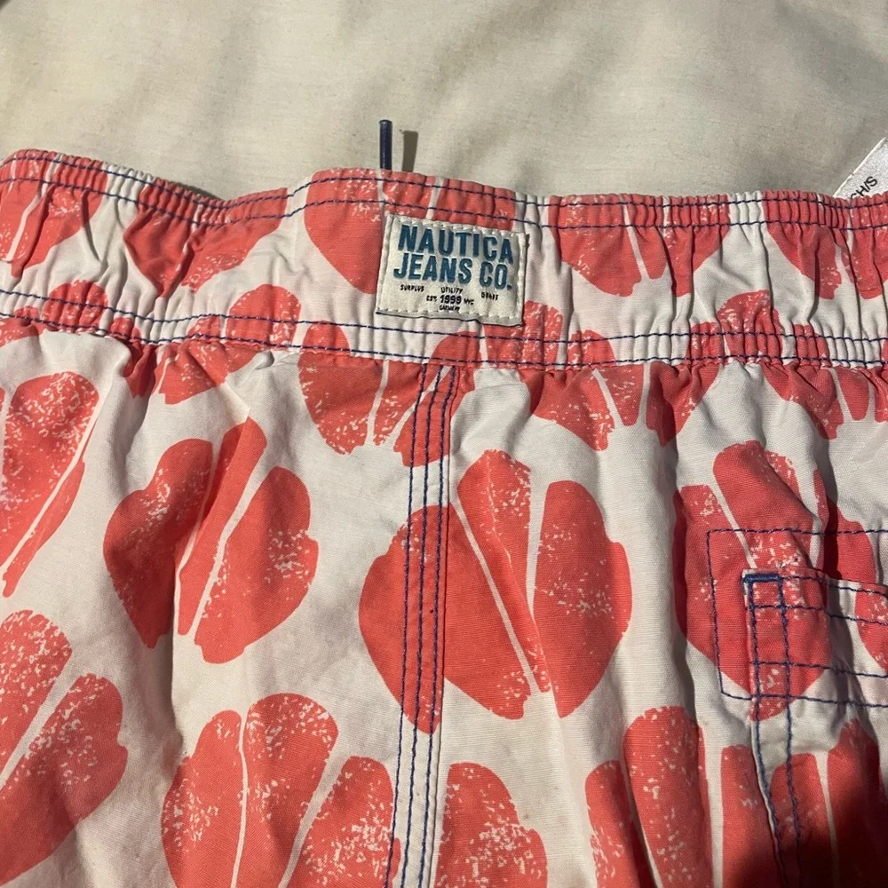 Fresh for the season! Trendy swim trunks! Orange, white and blue. Size small - Picture 2 of 4